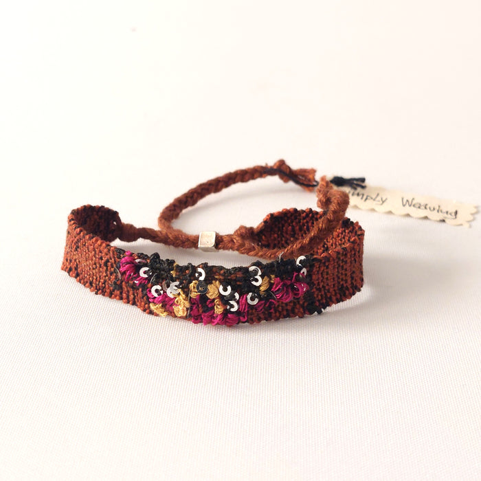Bracelets with sequins and embroideries