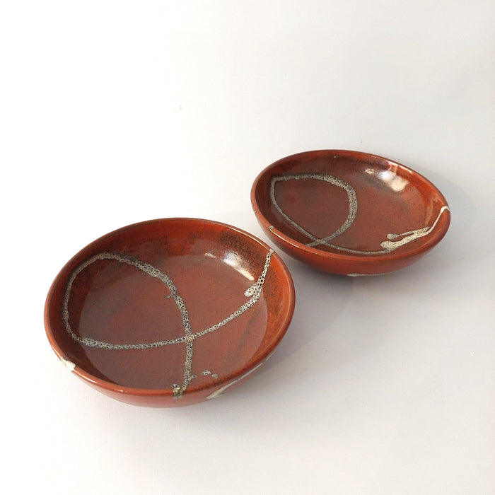 Shallow terracotta bowl