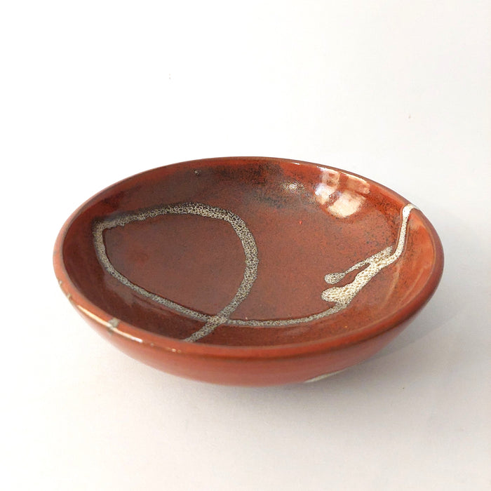 Shallow terracotta bowl