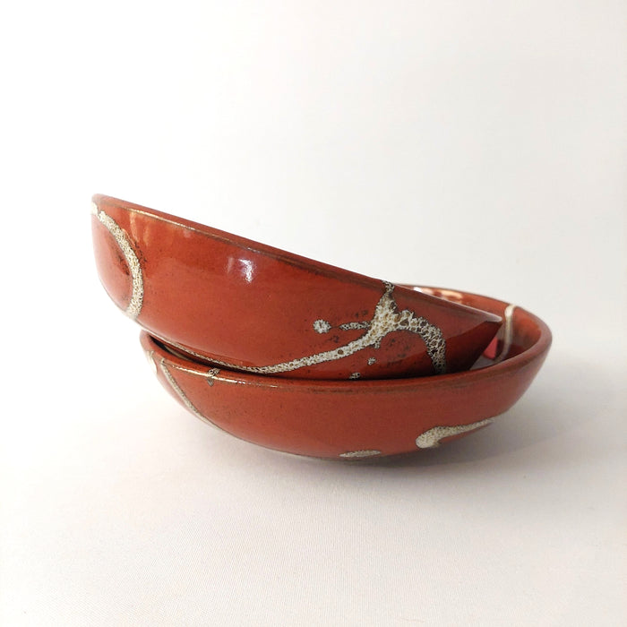 Shallow terracotta bowl