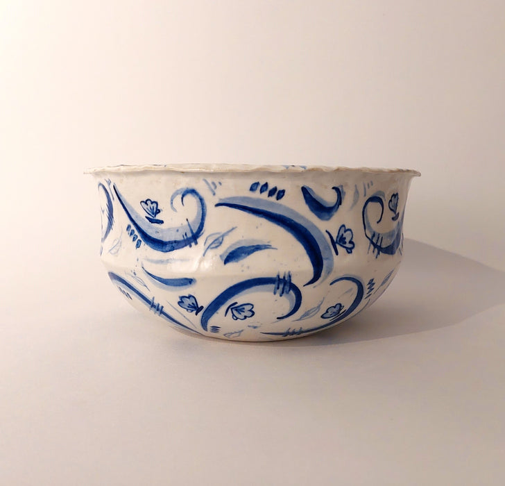 Ceramic bowl with blue decorations