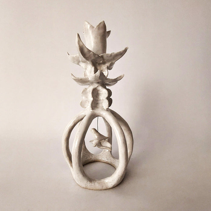 White candle holder with bird