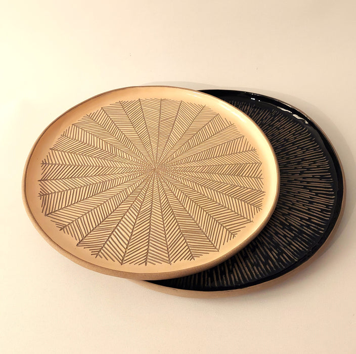 Ceramic platters with incisions