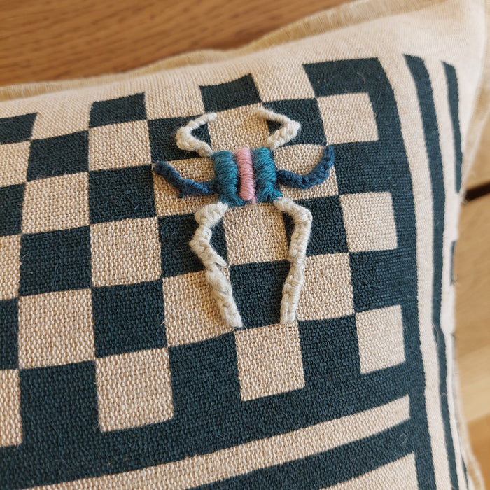 Cushion in Beige with Geometric Green print - M