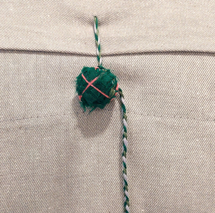 Silk cushion in green