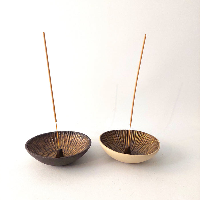 Ceramic incense holders in bronze shades