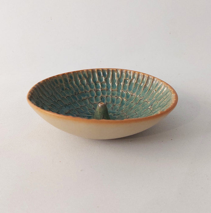 Ceramic incense holders in teal shades