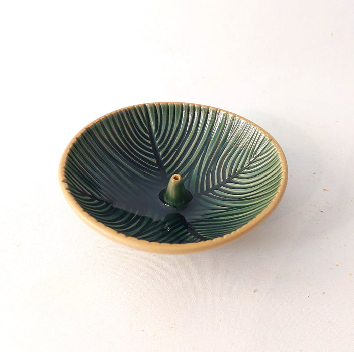 Ceramic incense holders in teal shades