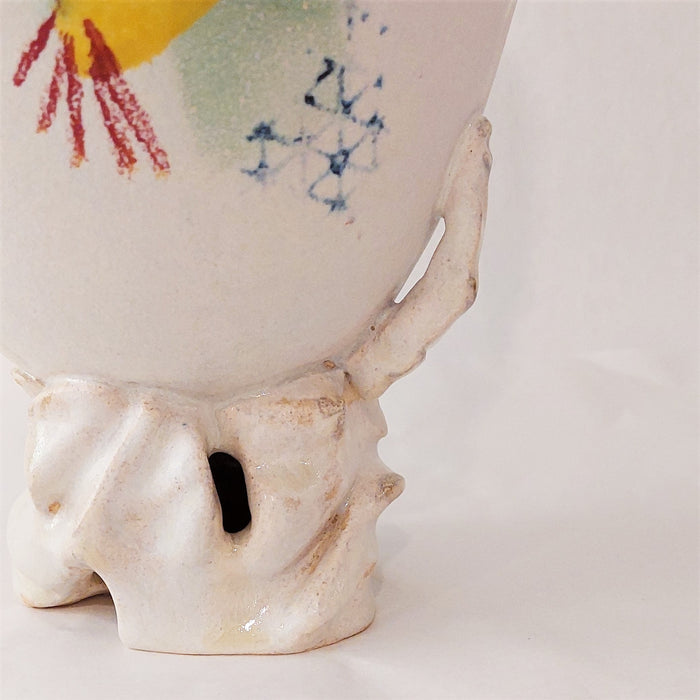 Ceramic Vase on Rock